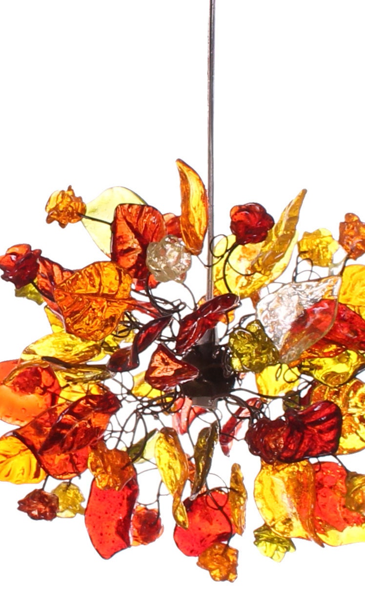 Triple pendants lights with warm color flowers and leaves for Kitchen Island.