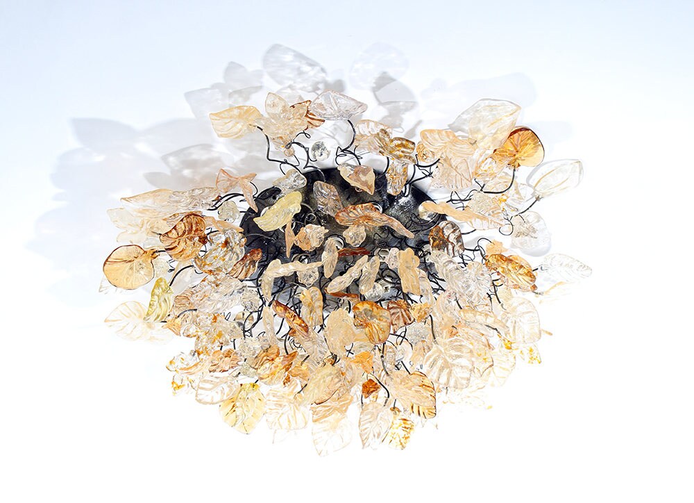 Elegant Flush Mount Ceiling Light with Champagne Color flowers and leaves.