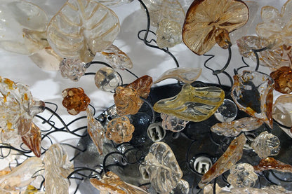 Elegant Flush Mount Ceiling Light with Champagne Color flowers and leaves.