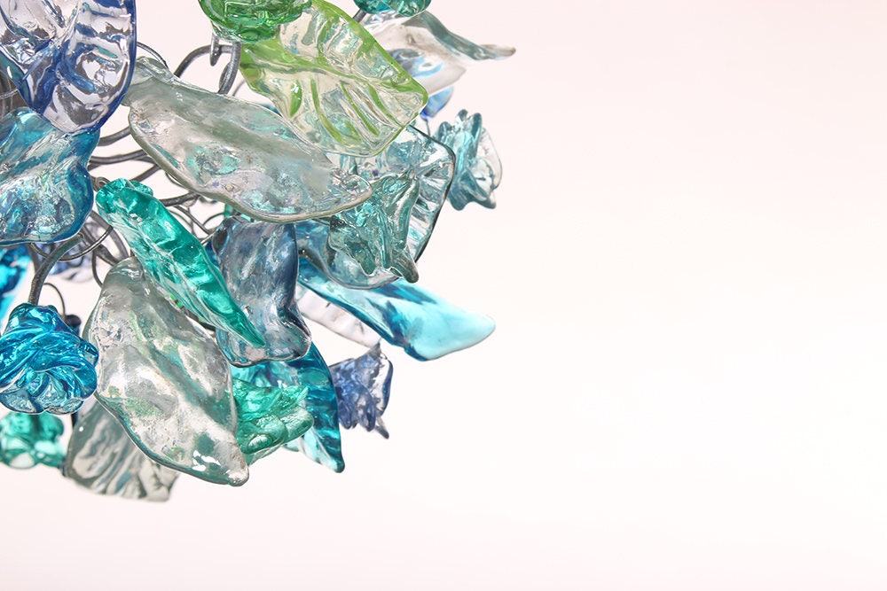 Pendant Lighting for kitchen island with sea color flowers and leaves.
