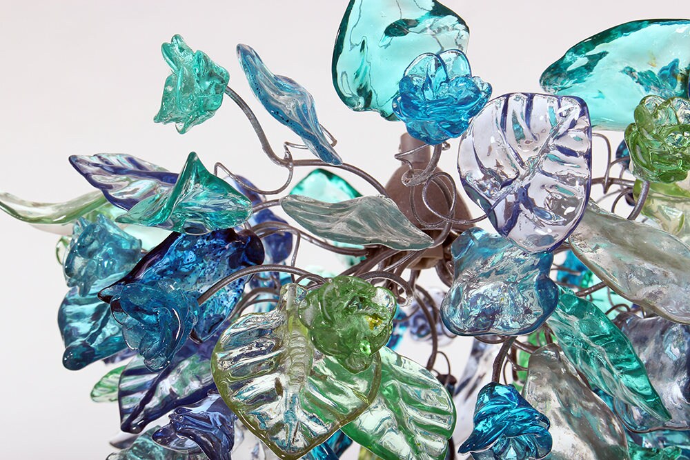 Pendant Lighting for kitchen island with sea color flowers and leaves.