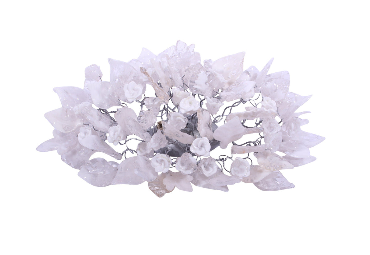 Silver Sconce With Whimsical Resin Leaves In clear and white color.