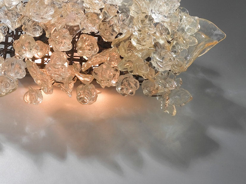 Wall light fixture - sconce up and down light, Transparent flowers and leaves over a mirror