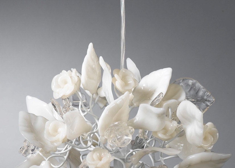 kitchen pendant lighting with clear and white flowers and leaves.