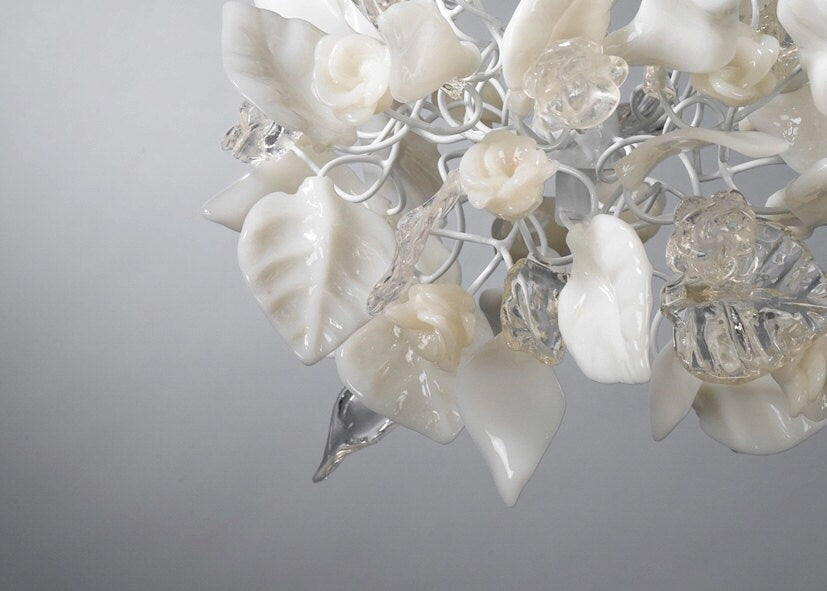 kitchen pendant lighting with clear and white flowers and leaves.