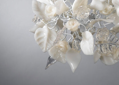 kitchen pendant lighting with clear and white flowers and leaves.