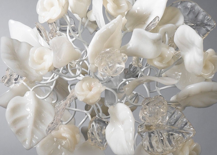 kitchen pendant lighting with clear and white flowers and leaves.