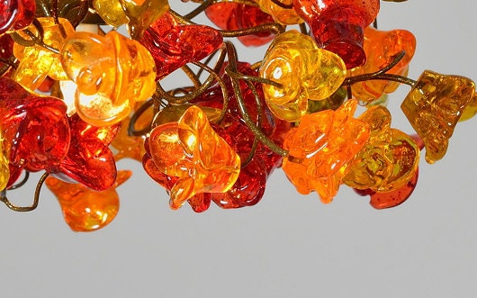 Pendant lighting, kitchen island lighting with warm color roses flowers.