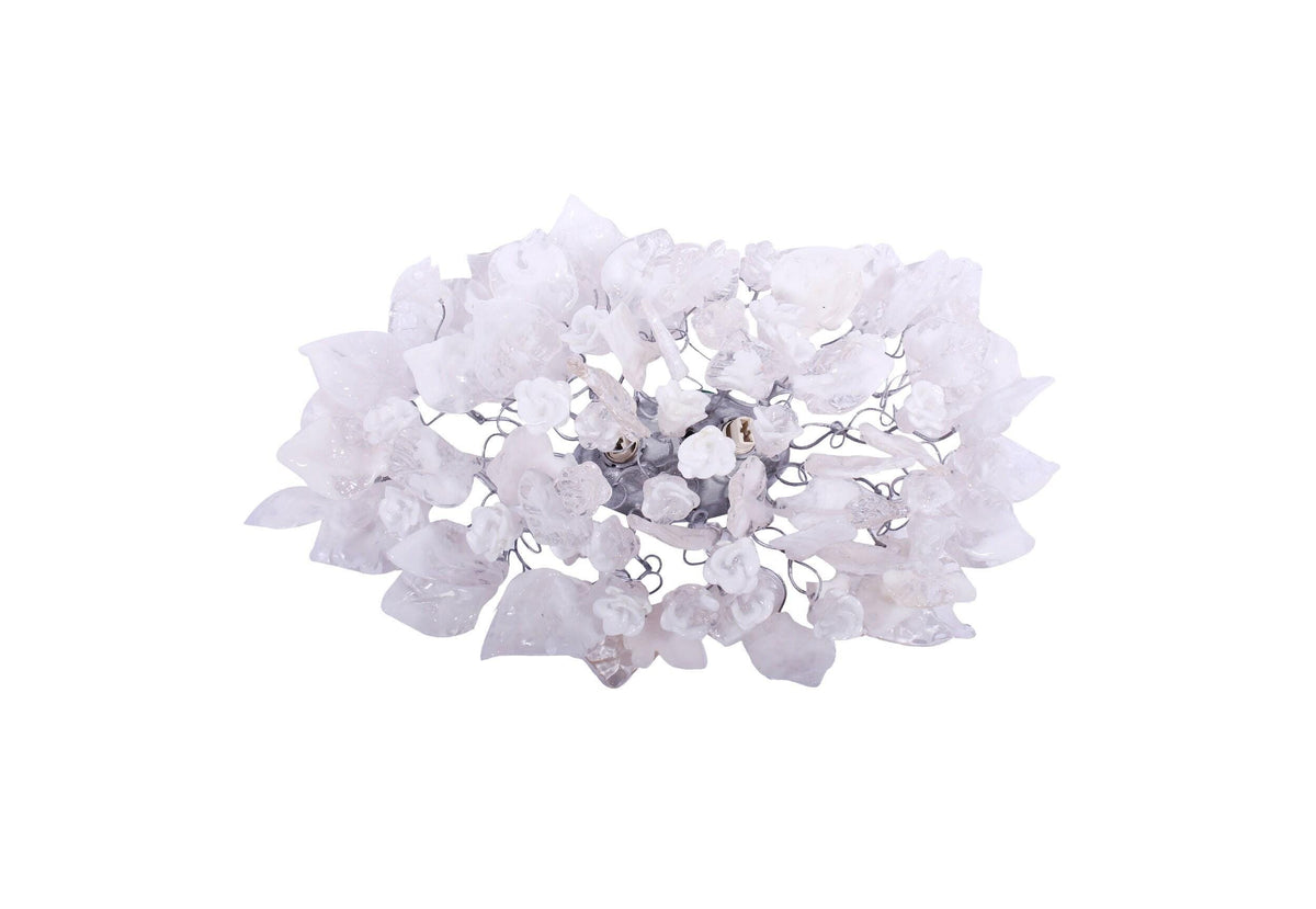 Silver Sconce With Whimsical Resin Leaves In clear and white color.
